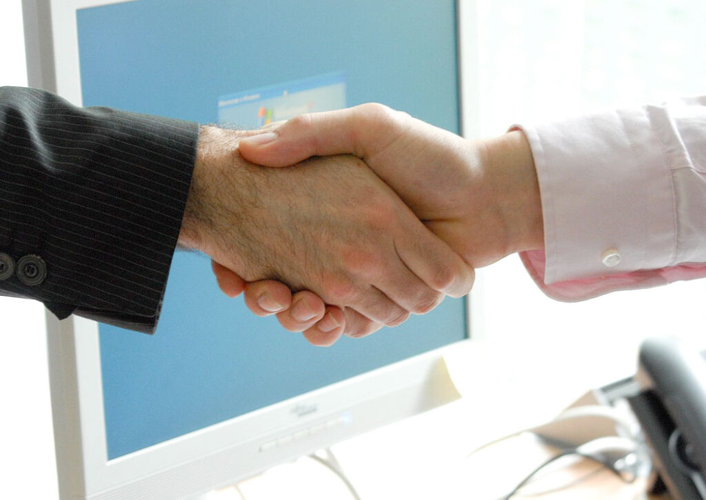 Abschied-Handschlag